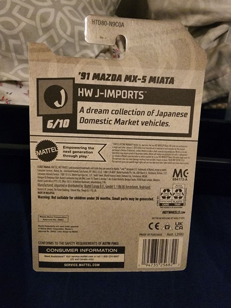 Yellow & Black HotWheels: 91 Mazda MX-5 Miata