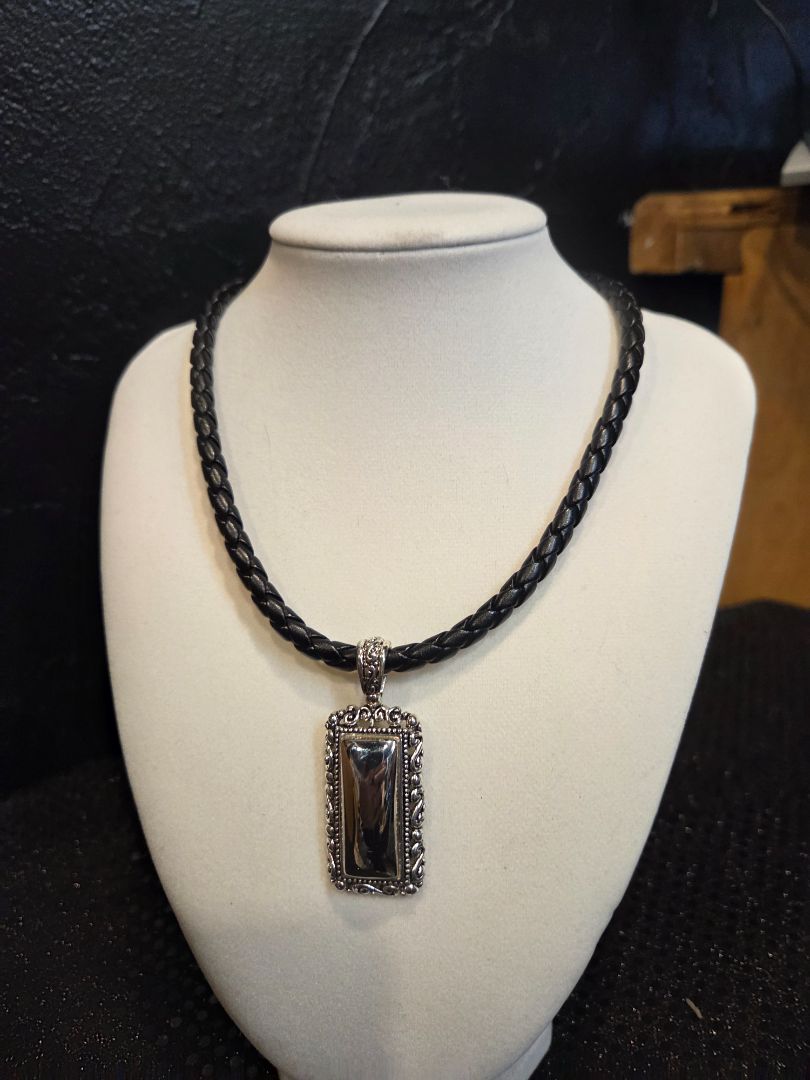 Jewelry Silver Toned Pendant on Leather Braided cord