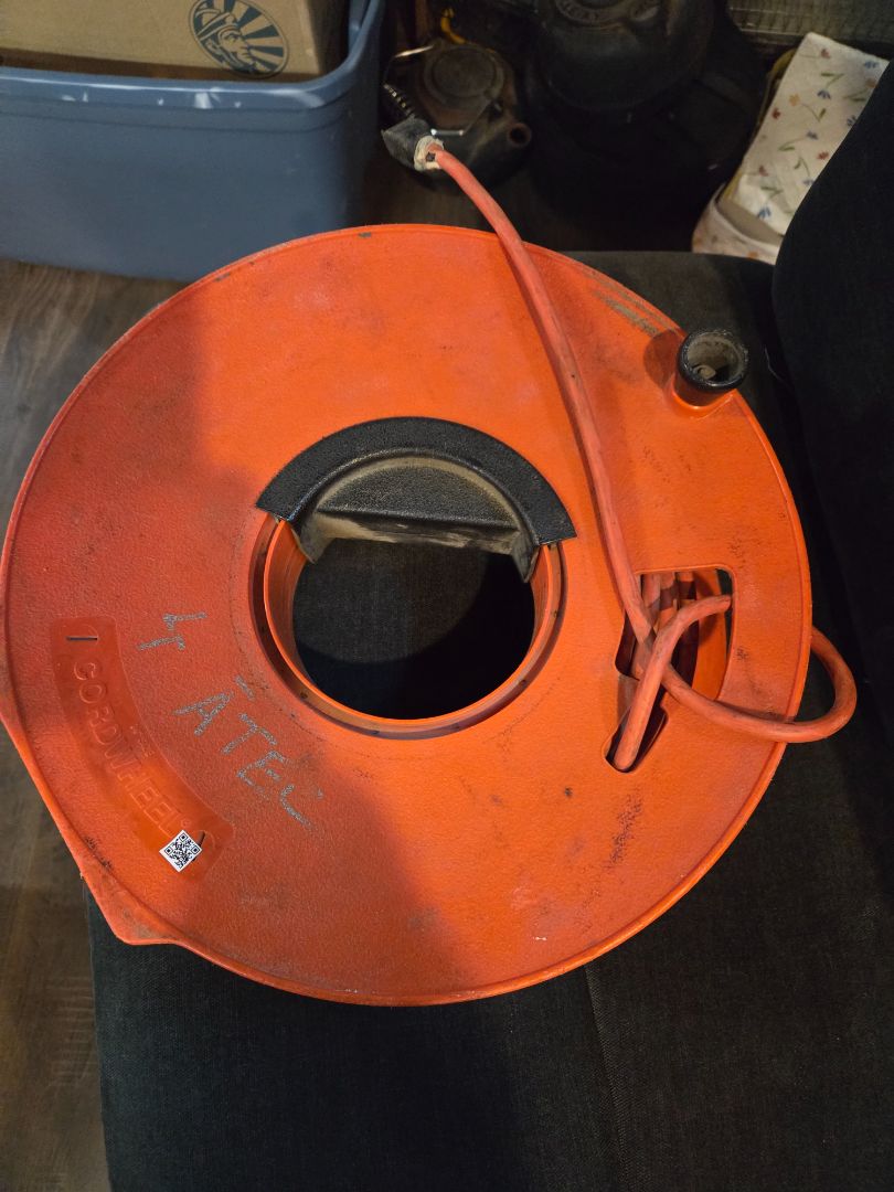 Cord wheel and extension cord