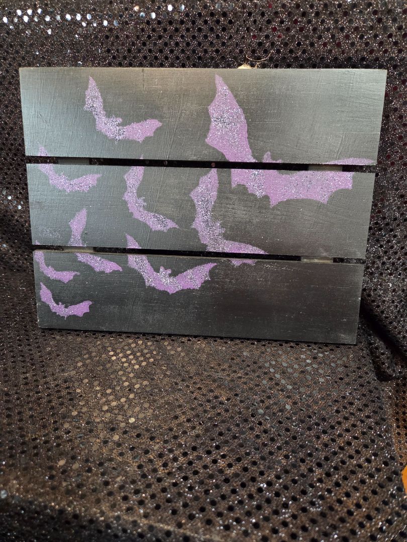 Black Sign with Bats