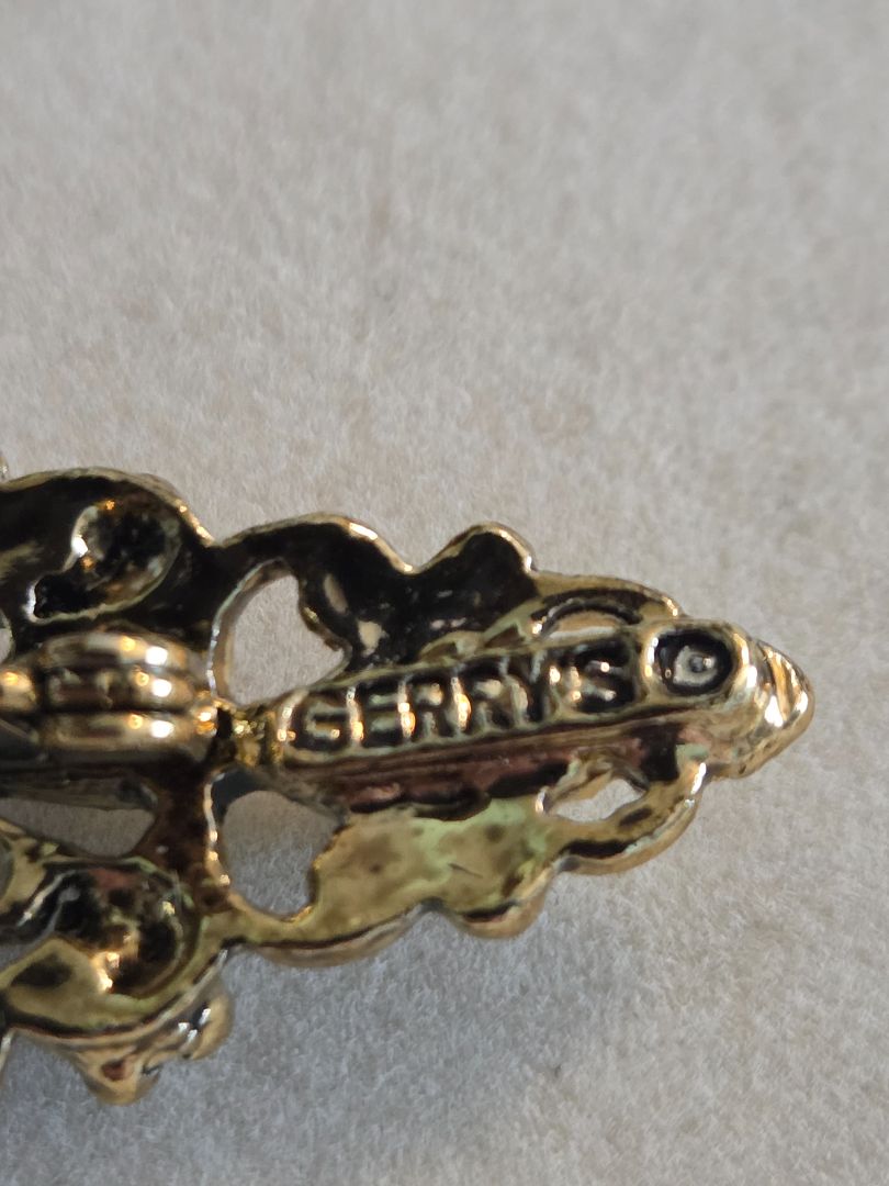 Gerry's gold plated floral bar brooch dark green rhinestone