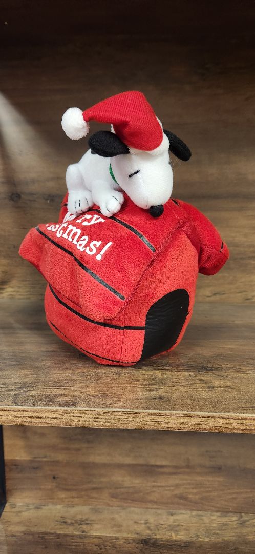 Red Disney Snoopy plush on a red dog house
