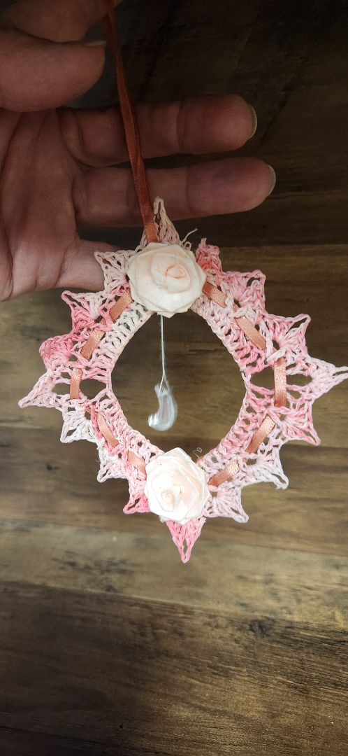 pink crocheted ornament with rose & moon drop