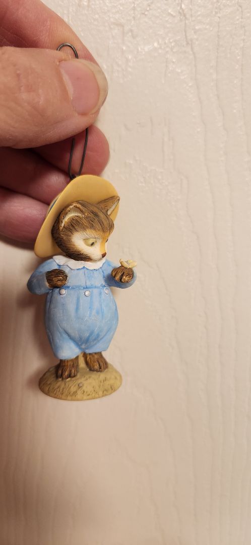 Hallmark Tom kitten wearing overalls & hat, holding a tiny butterfly ornament