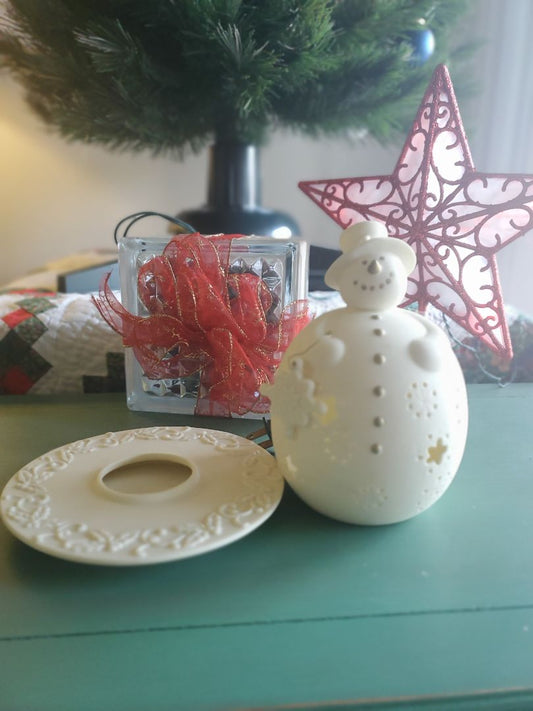 At home america porcelain snowman candle holder
