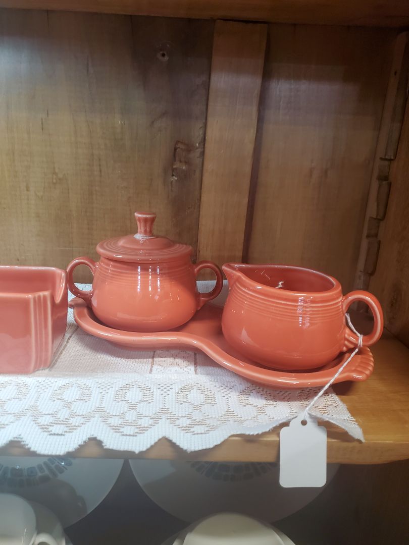 Persimmon Fiestaware cream and sugar with lid and figure 8 tray (as is)