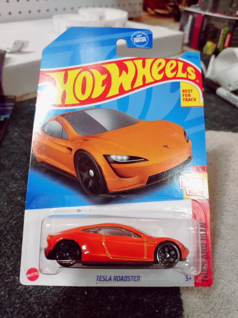 Orange Hot Wheels Tesla Roadster