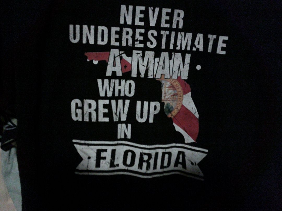 NEVER ESTIMATE A FLORIDA MAN 2XL T-SHIRT