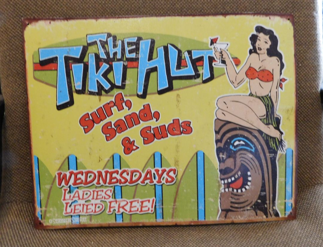 The Tiki Hut Metal Sign