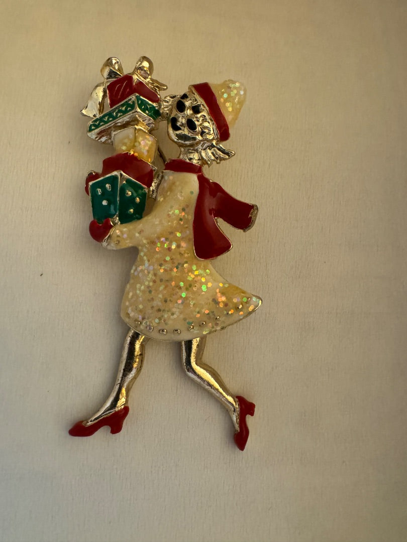H-Woman holiday shopper brooch