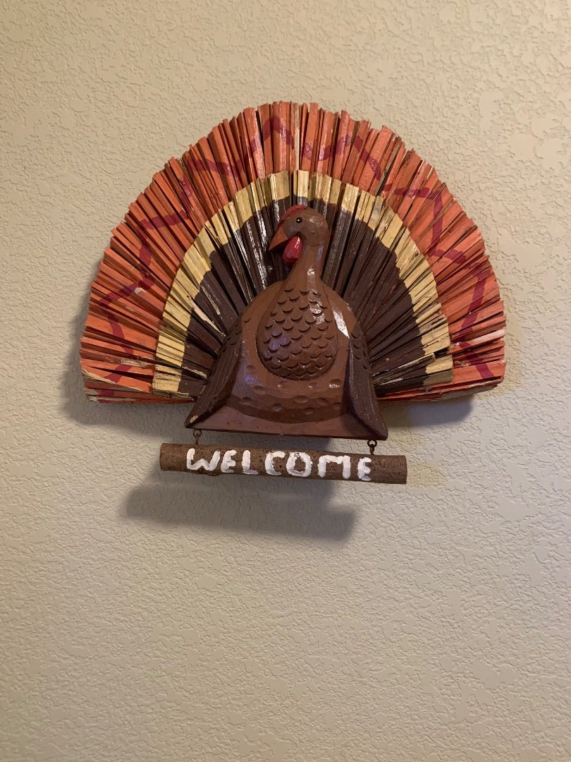 Brown/red Door hanging with turkey and welcome