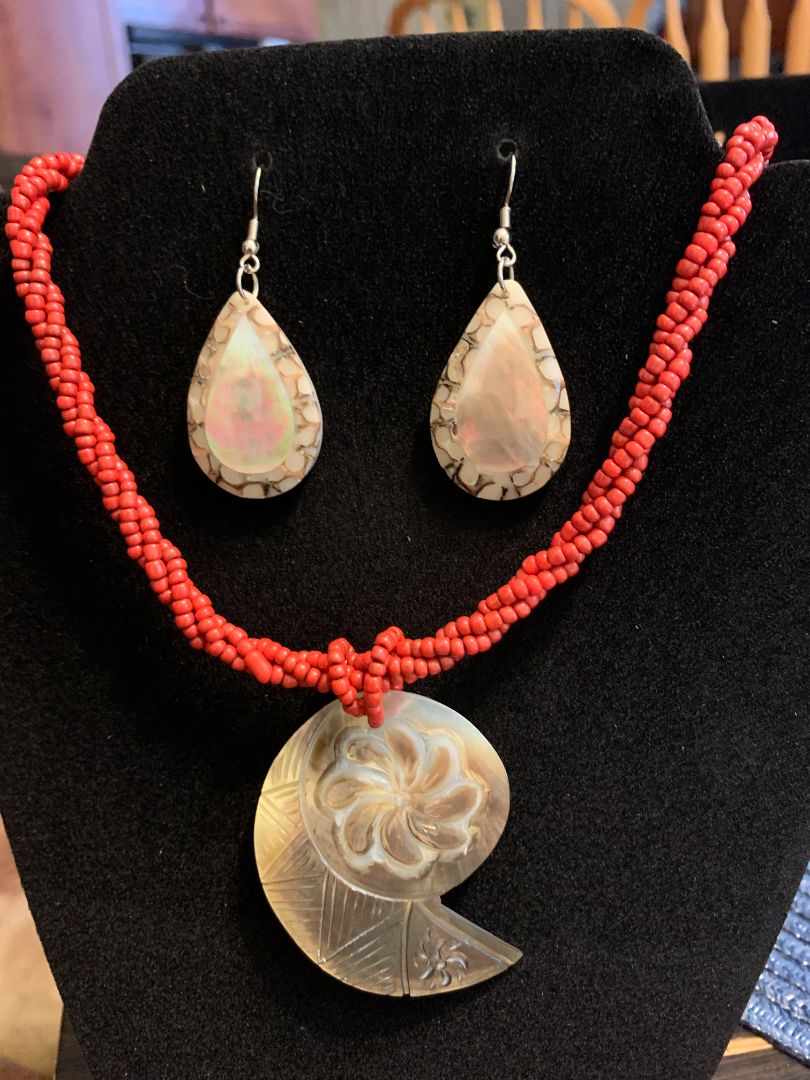 red red coral color twisted bead necklace and earring set with carved nautilus shell pendant