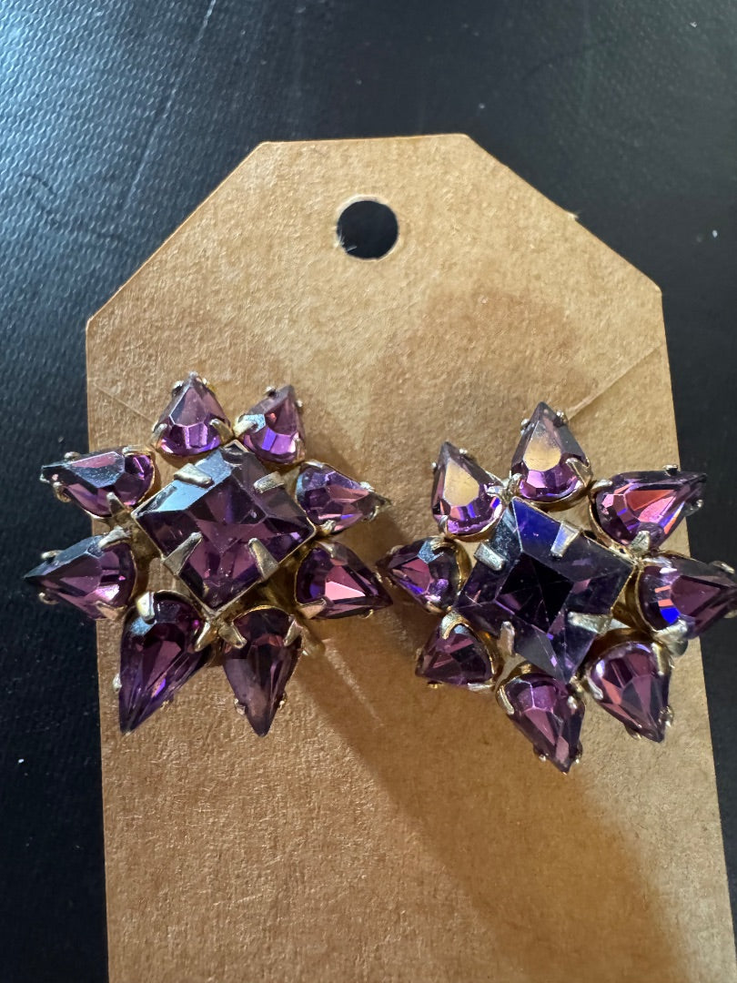 Purple starburst rhine clipback earrings
