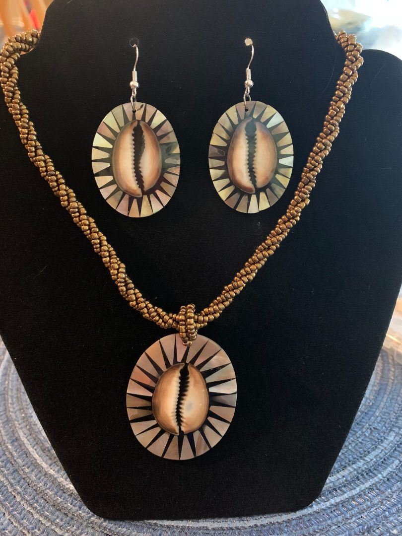 brown cowvie shell necklace and earring set