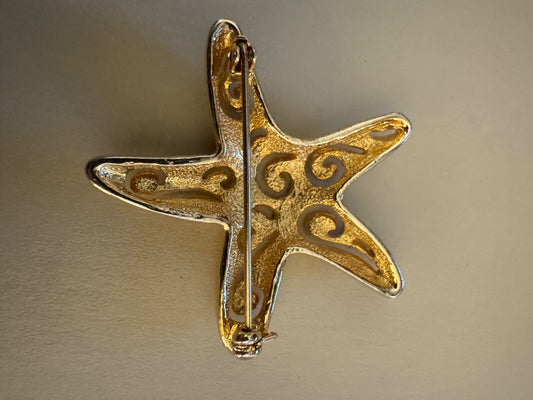 Goldtone cutout starfish brooch