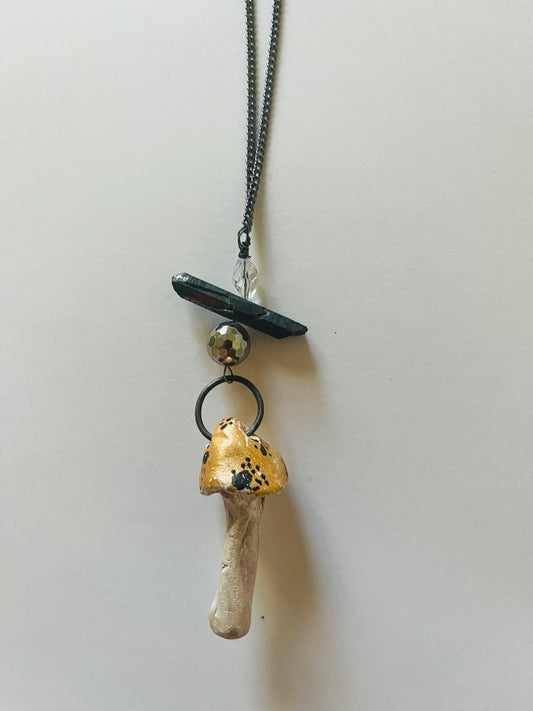 Black Spear with 2 Glass Beads attached to a Kiln Fired Mushroom Necklace. Jewelry