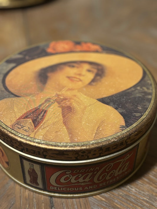 “Gibson girl” advertising tin