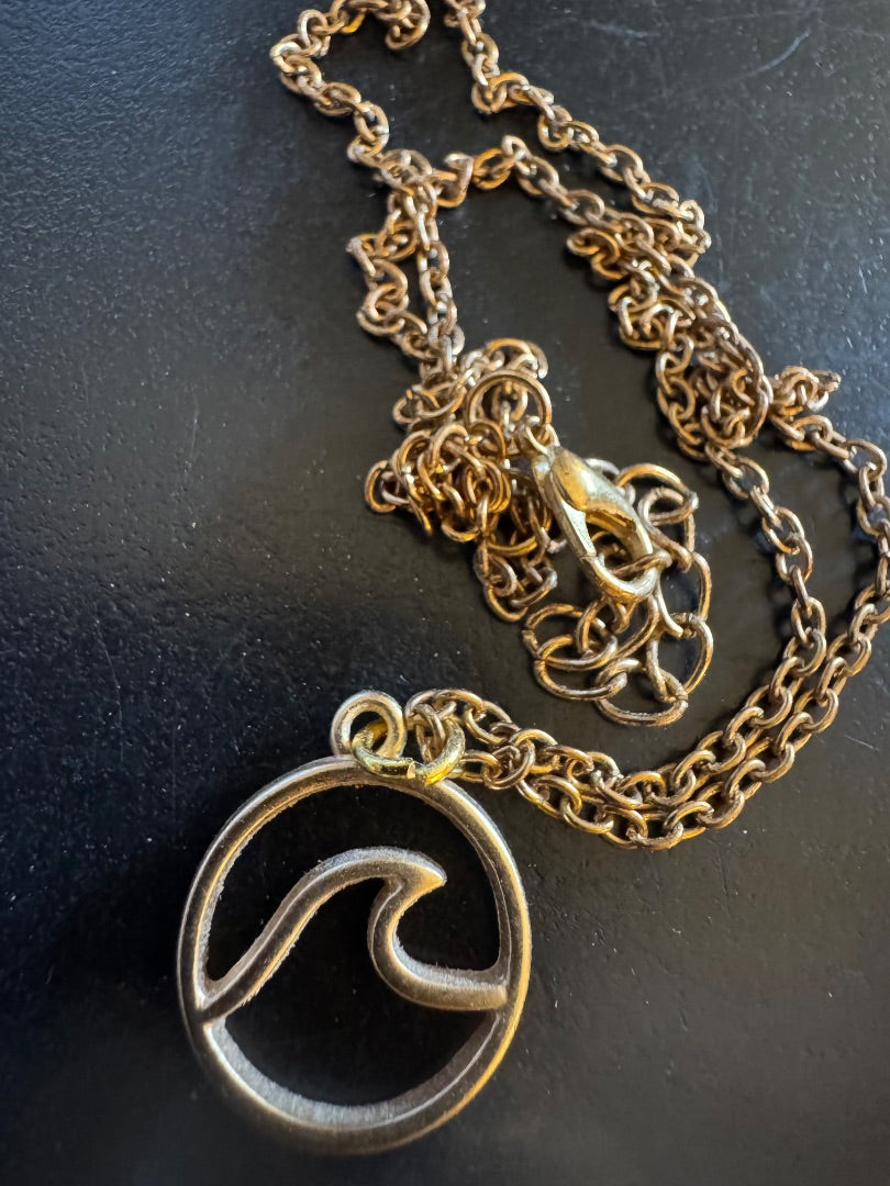 Wave gold tone necklace