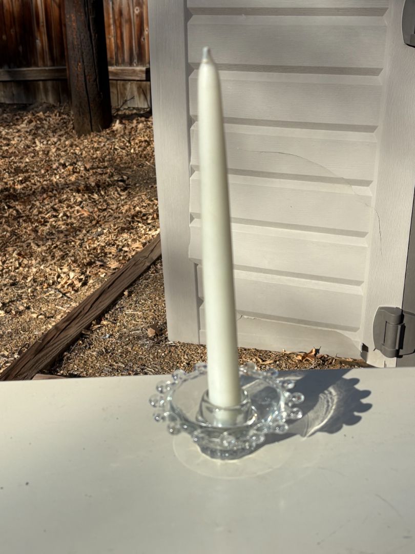 GlassCandle holder with candle