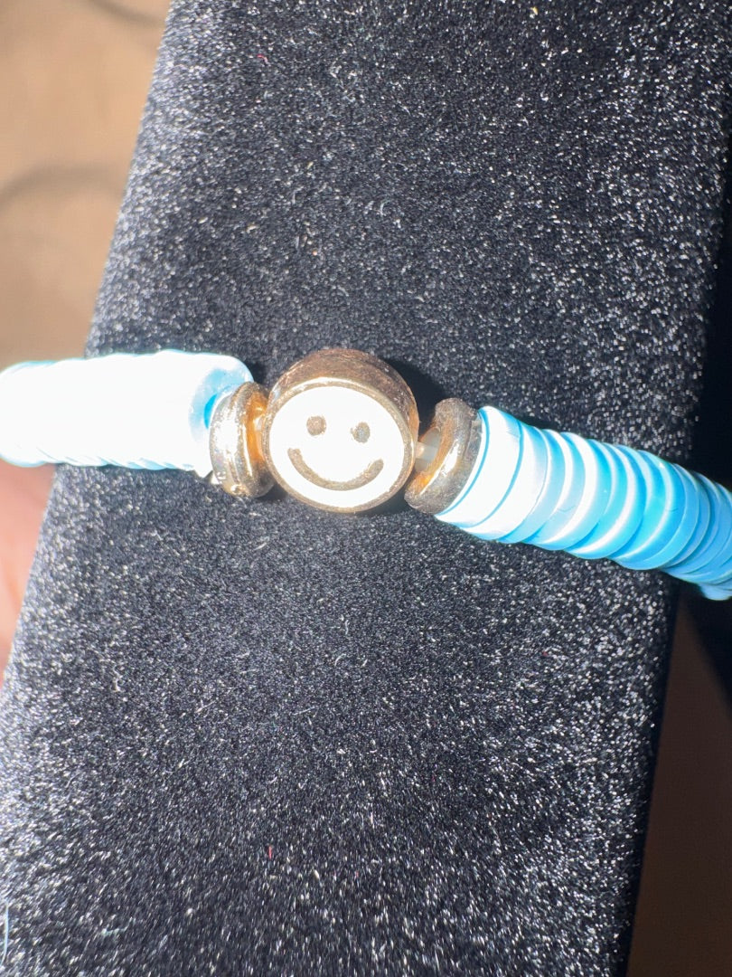 Happy face blue stretchy bracelet