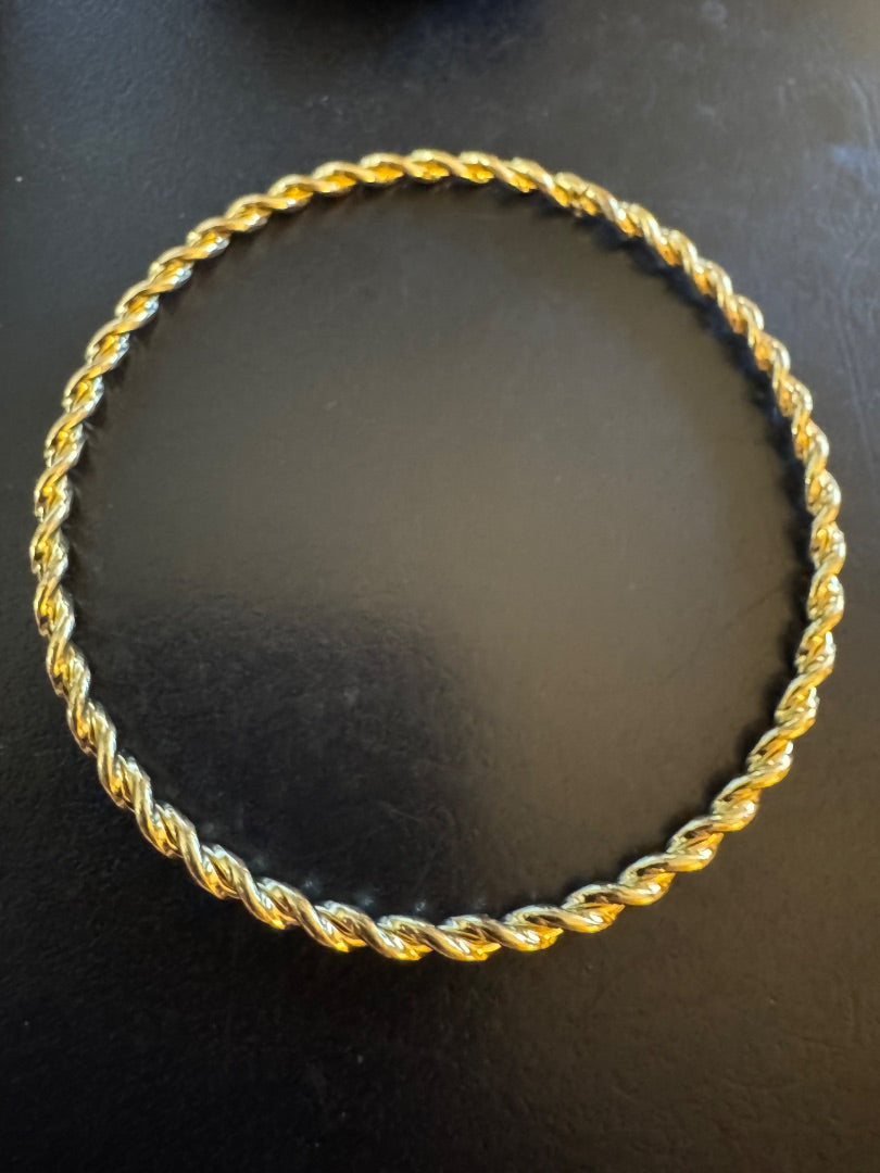 Gold tone bangle