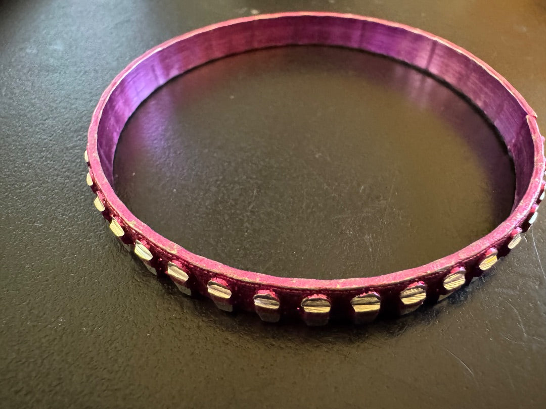 Pink silver tone bangle
