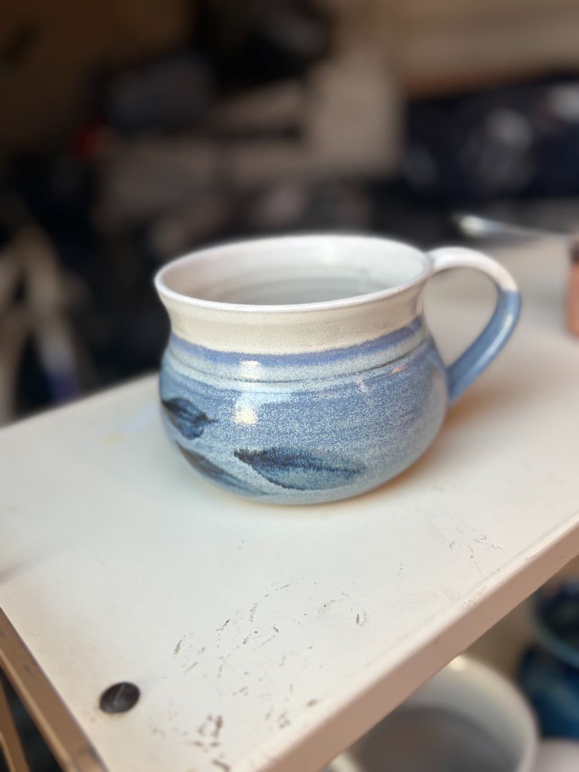 Handmade pottery blue leaf mug
