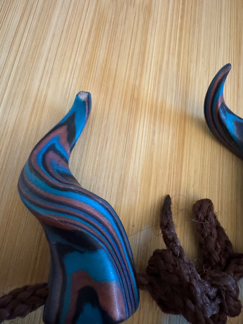 Blue swirl Pan Horns (small chip on one)