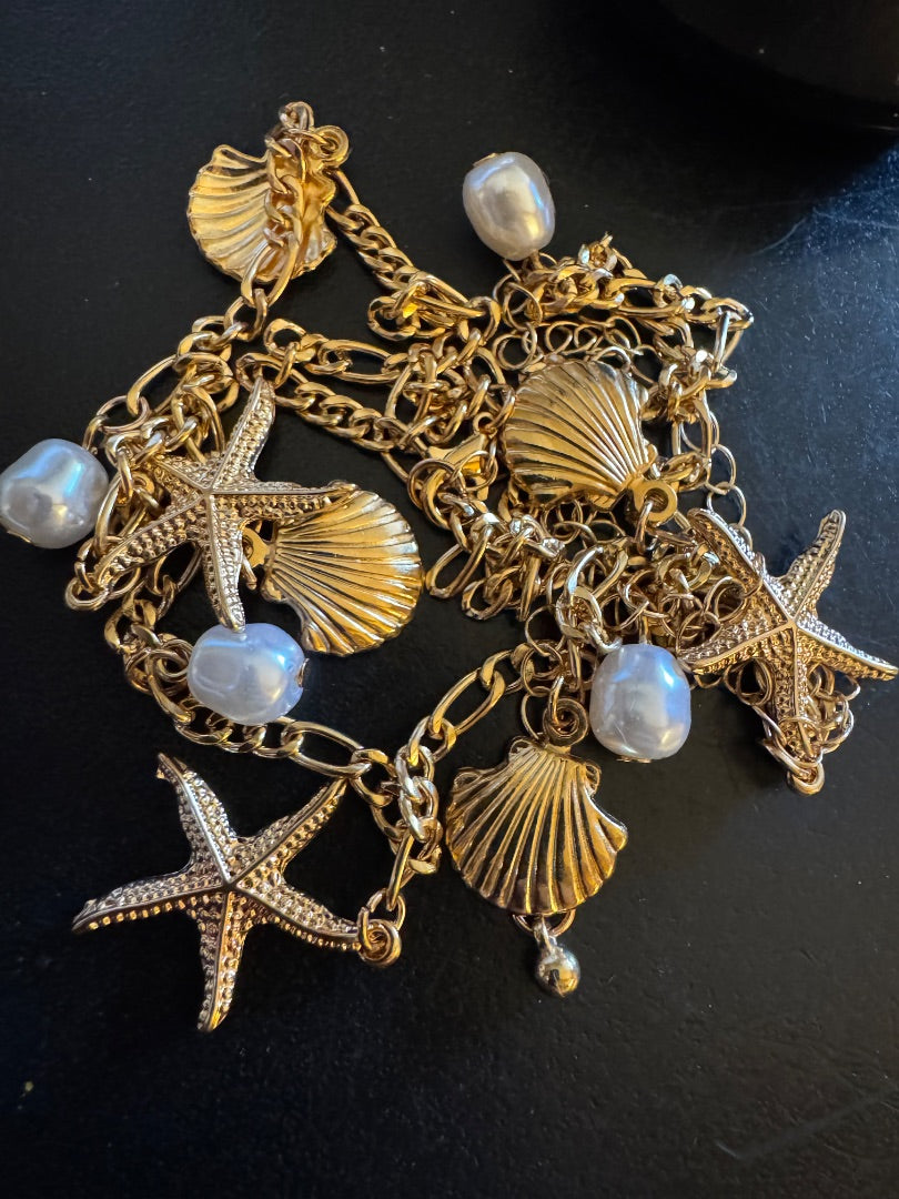Gold tone seashell chain necklace