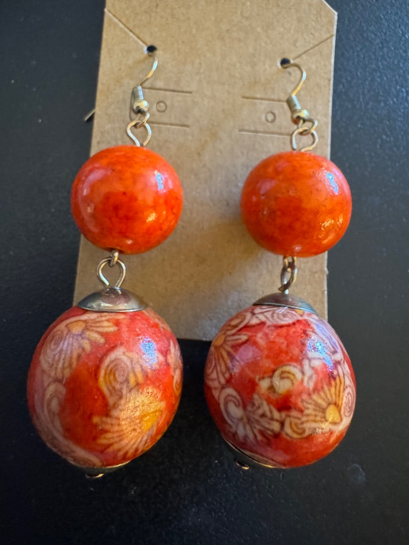 Orange double bead dangle earrings