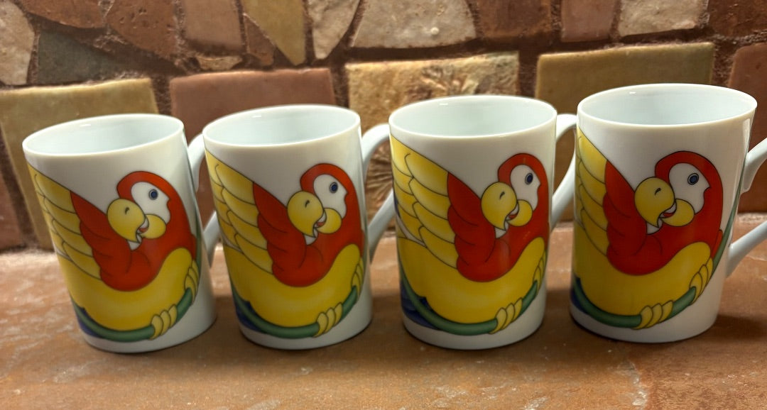 Red and yellow Fitz and Floyd 4 mugs “Parrot in Ring”, 4” h x 2.75” diameter