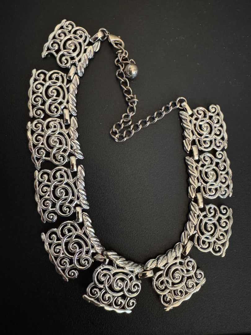 Ornate silver tone choker necklace