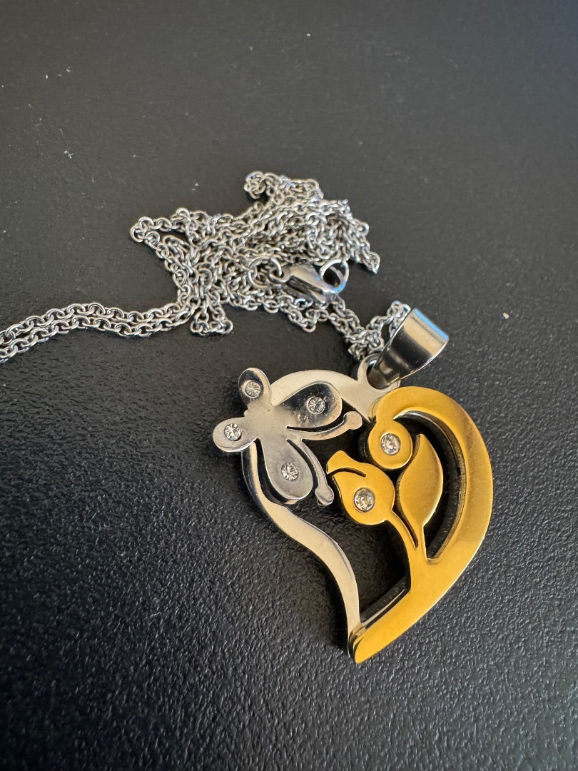 Stainless steel? two tone heart w/butterfly & flower necklace