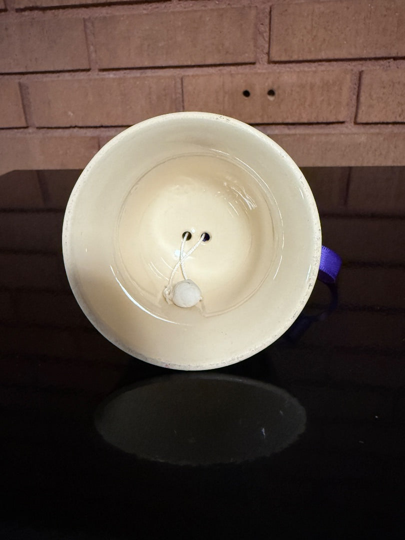 Cream MacBeth-Evans Ceramic Bell with Hedgehog, 3” tall, 3 1/2” wide