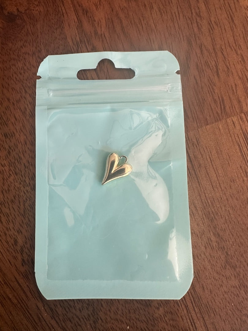 Gold heart charm