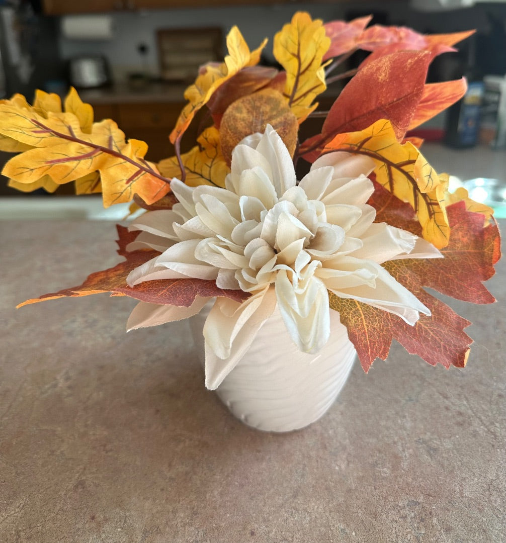 Ceramic pot with foliage