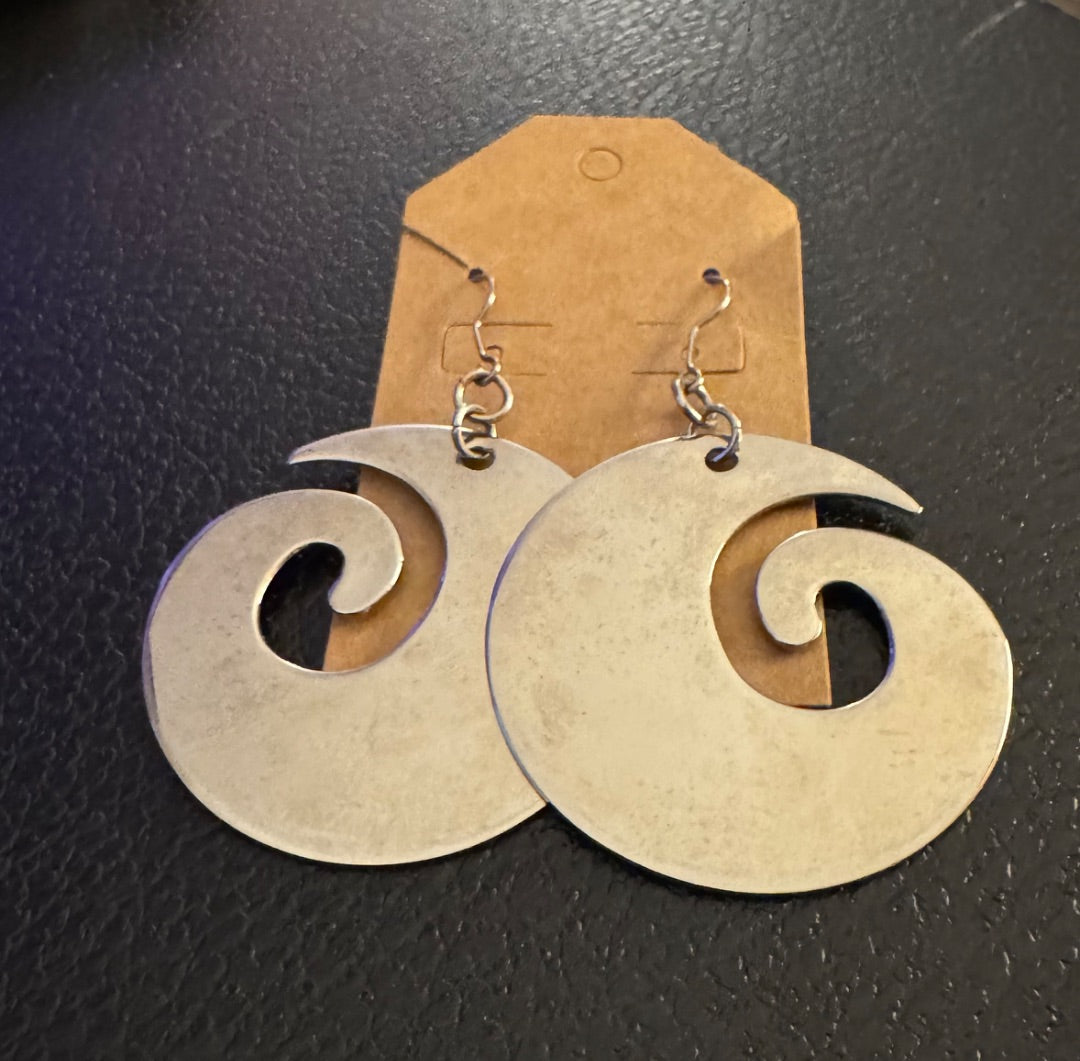 Big swirl silvertone earrings