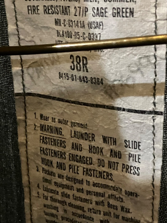 Vintage Navy Uniform 38 Regular tear where 2 legs meet between legs.