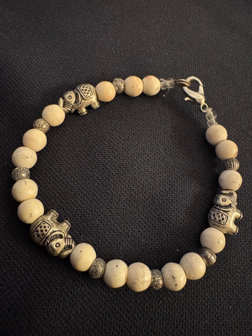 Ivory Silvertone Elephant clasp bracelet
