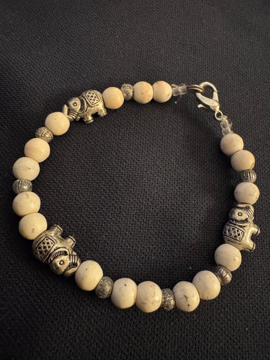 Ivory Silvertone Elephant clasp bracelet