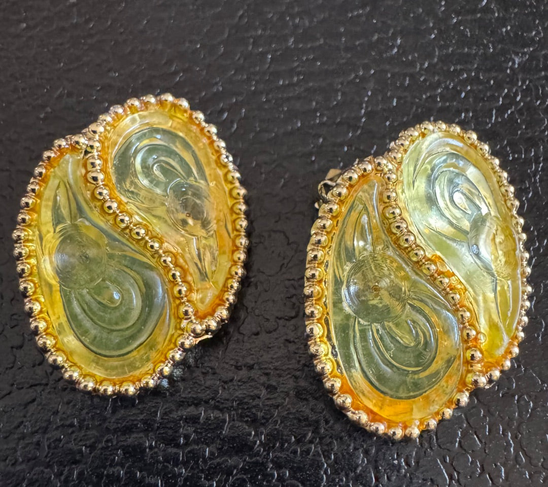 Yellow goldtone swirl clipon earrings