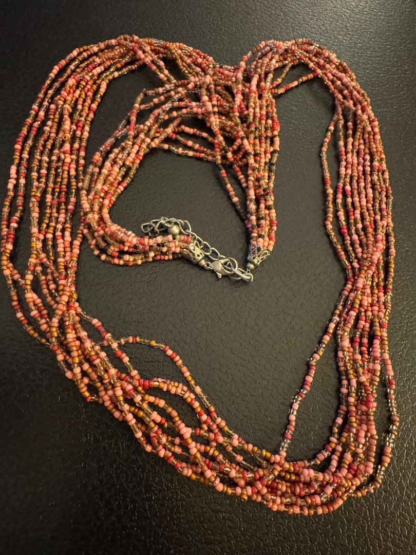 Long multi browntone bead necklace