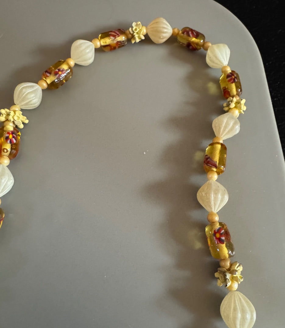 Flower clasp mixed media necklace