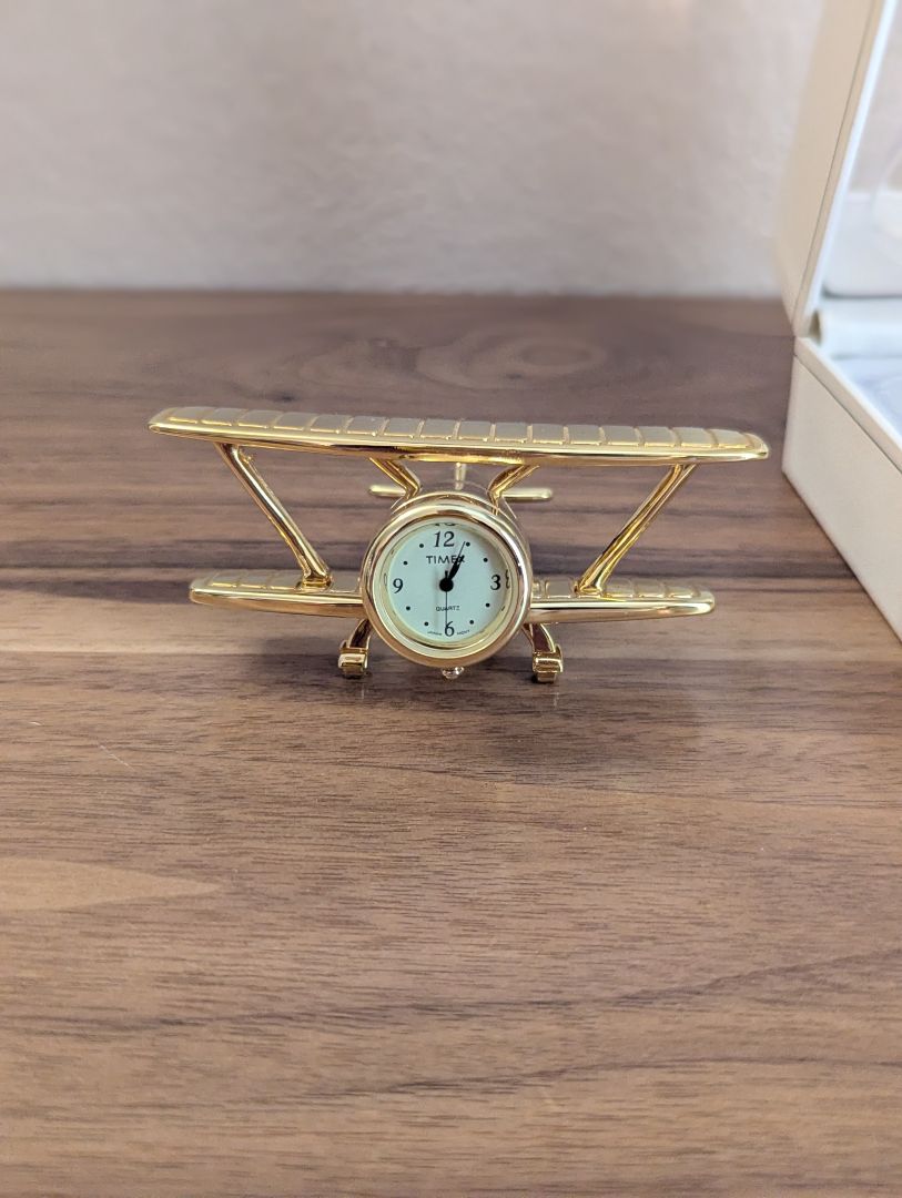 Timex Timex brass bi-plane desk clock