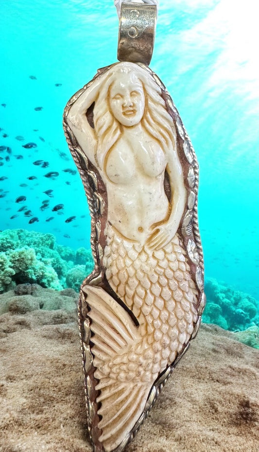 Bonecarved mermaid pendant