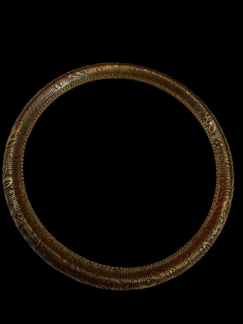 Gold tone design bangle