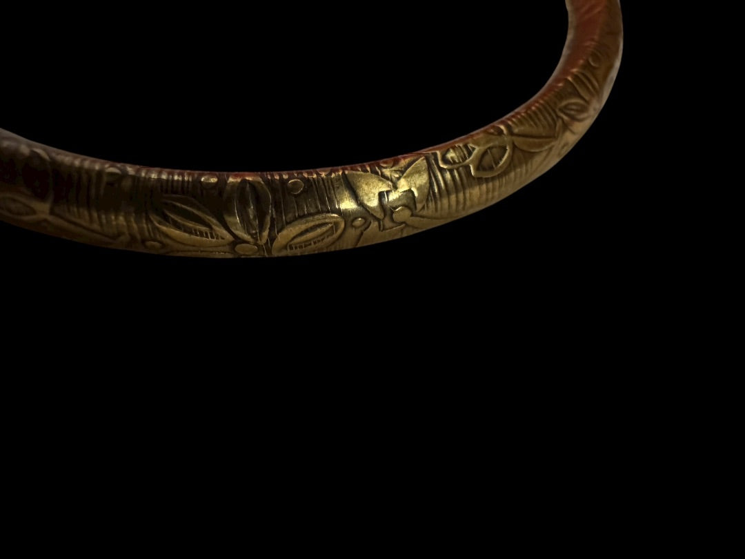 Gold tone design bangle