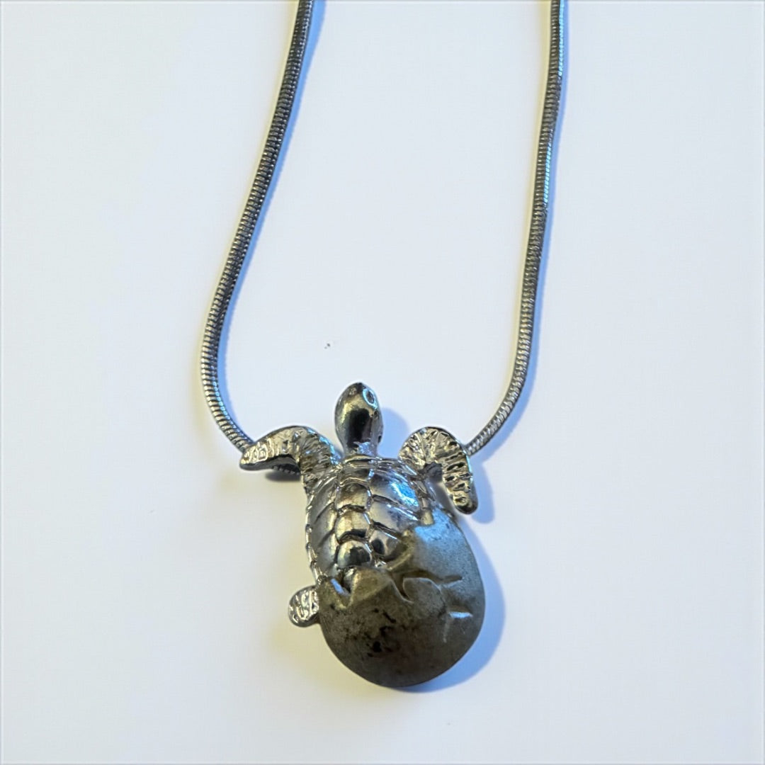 Hatching turtle necklace