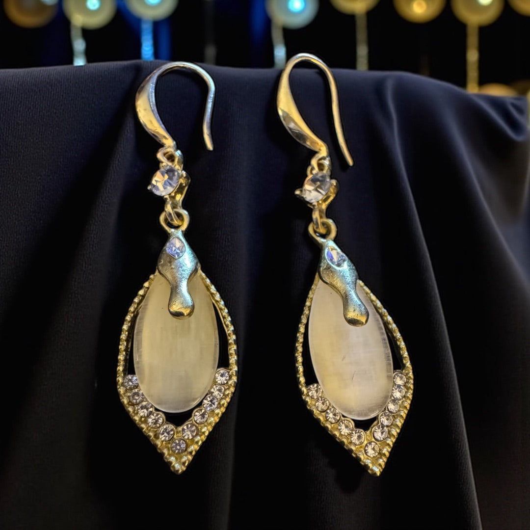 Dangle Ivorycolor silvertone earrings