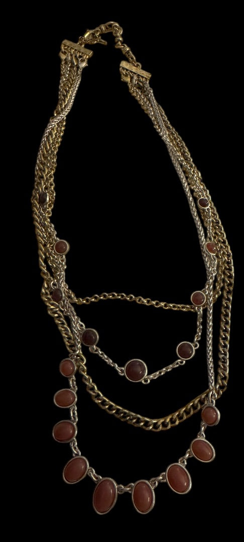 Lucky silvertone multi strand orange accent necklace